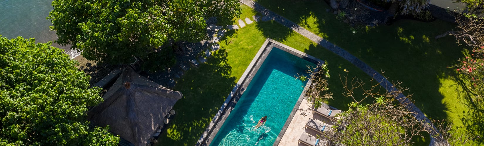 family spending time in holiday villa in Bali