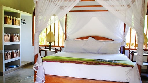 Khomba Beach House Camera da letto 1