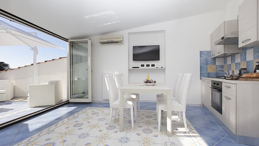 Apartment Tetto Bianco Zona pranzo