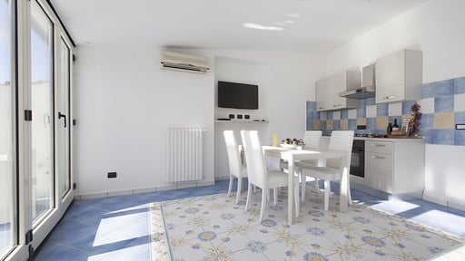 Apartment Tetto Bianco Zona pranzo