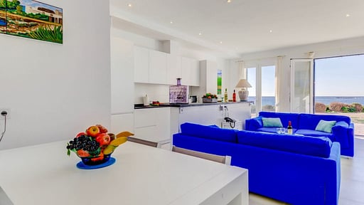 Beachfront Apartment Migjorn Playa Dining area