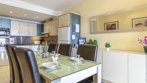 Ivory Apartment Dining area