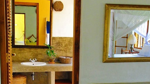 Khomba Beach House Camera da letto 1