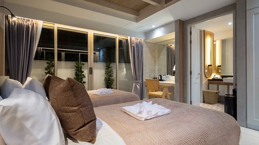 L'Archipel Villa Спальня 5