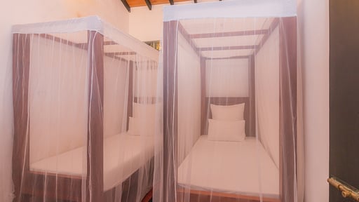 Red Parrot Beach Villa Schlafzimmer 2