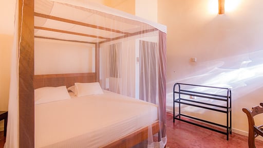 Red Parrot Beach Villa Schlafzimmer 1