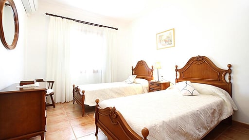 Rei Vila Спальня 2