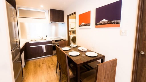 SnowDog Village Two Bedroom + Studio Dining area