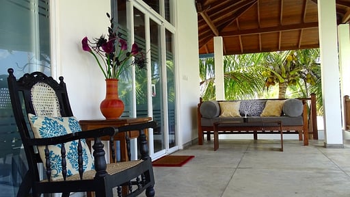 Sunset Reef Beachfront Villa Terras/Veranda