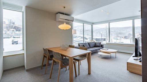 The Maples Niseko 2 Bedroom Village View Dining area