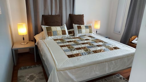 Tropical Palms Apartment Schlafzimmer 1