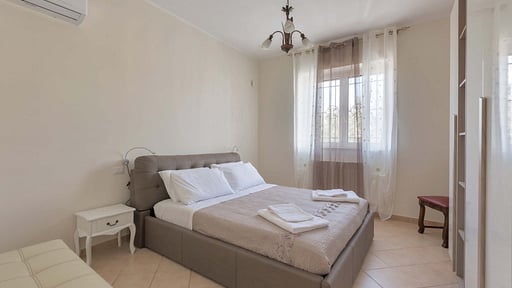 Villa Irma Schlafzimmer 1