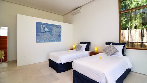 Villa Pulau Camera da letto 1