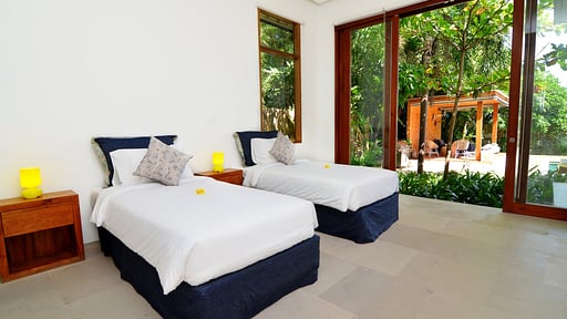 Villa Pulau Camera da letto 1